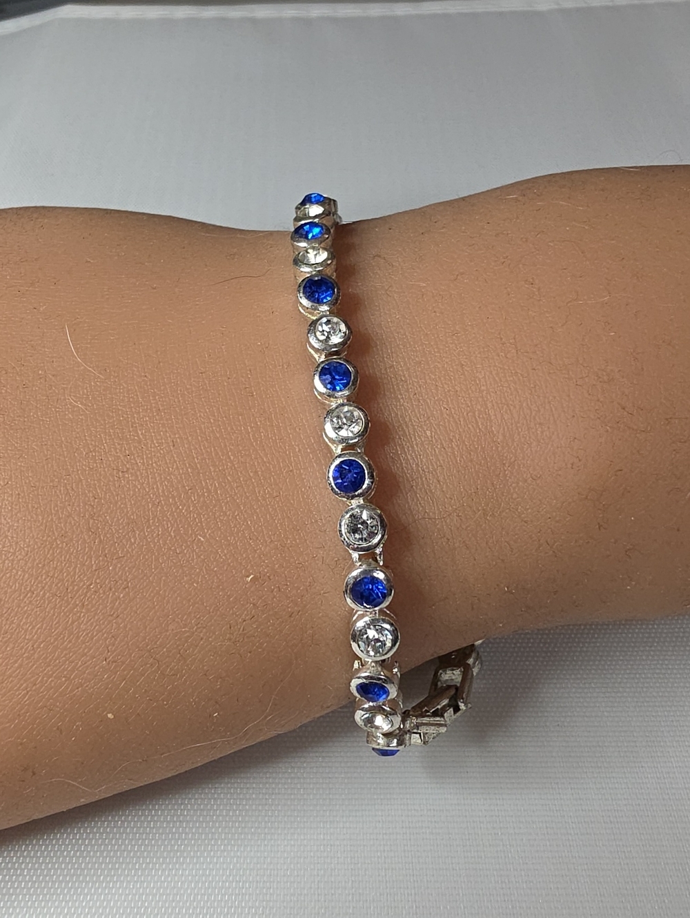 Avon Silver-Tone Bracelet with Blue and Clear Stones